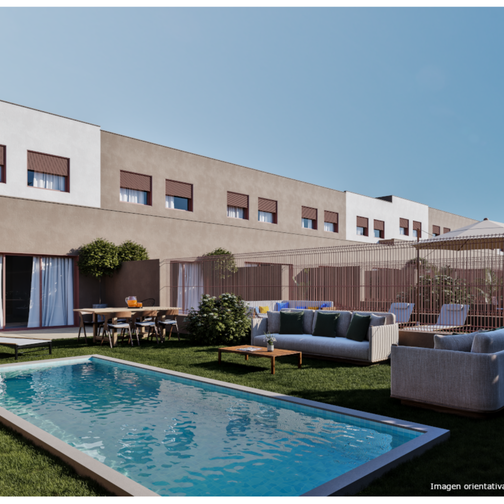 Foto del exterior de una casa, con piscina
